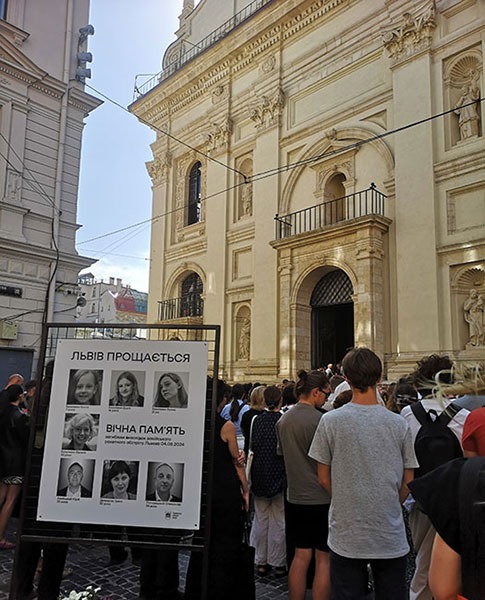 picture from the funeral of a mother and her 3 daughters