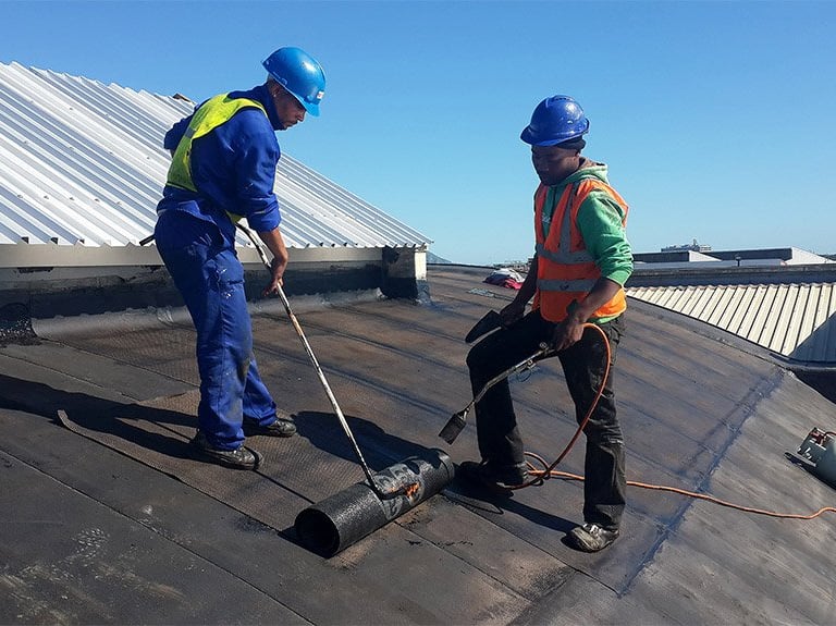 Tswanacrete is ABE Torch-On bituminous membrane — long-lasting waterproofing solution for roofs, terraces, and exposed area