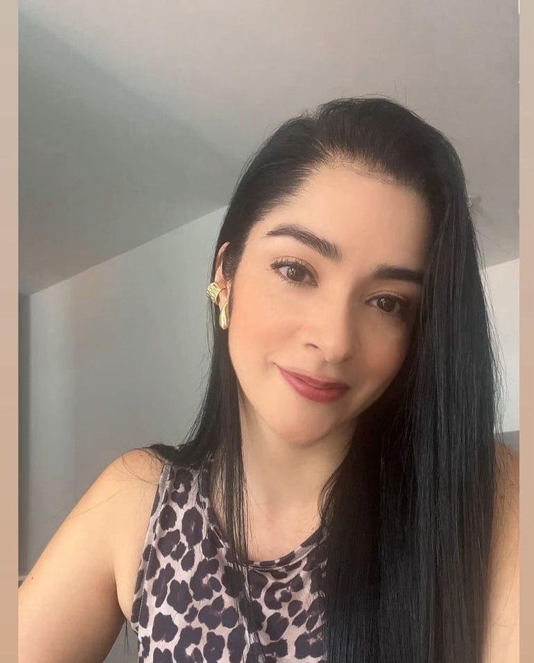 Professional psychologist smiling for a photo in formal wear