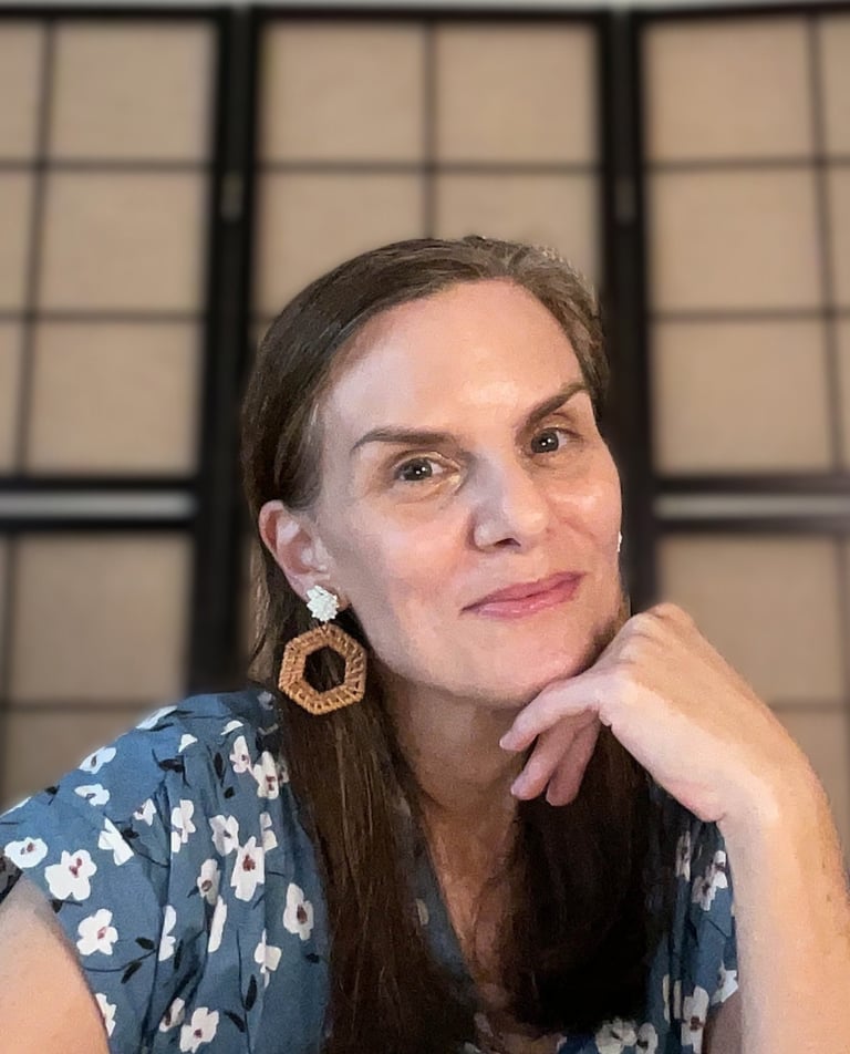 writer creator Amy A. DeCew office candid headshot