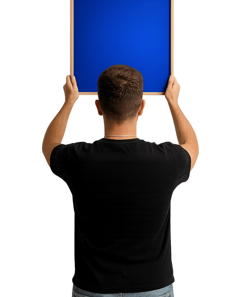 a man holding a blue square shaped picture frame