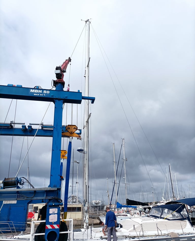 A yacht is re-masted.