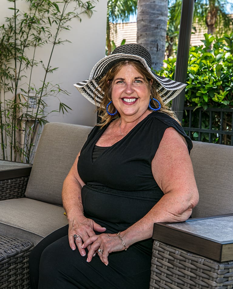 A photo of Nandy Town, the founder of Manor Magic in Celebration, Florida, who specializes in design and soft staging