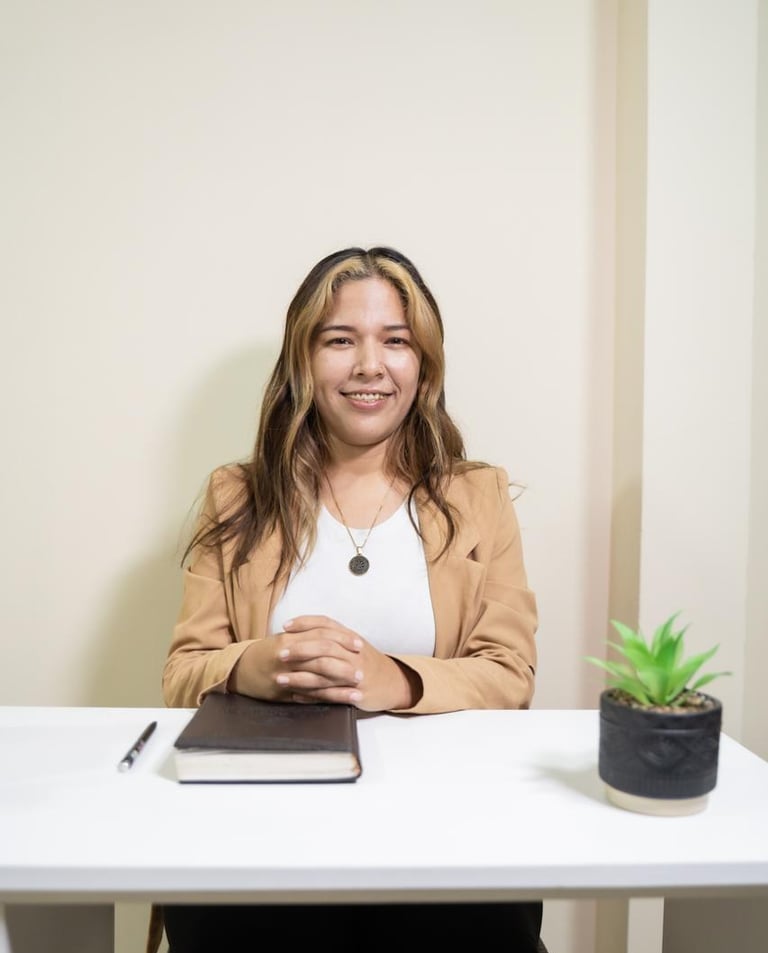 Professional psychologist smiling for a photo in formal wear