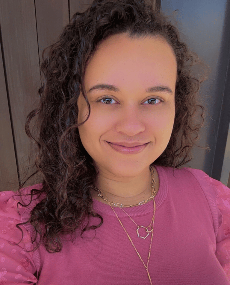 a woman with a necklace and a necklace