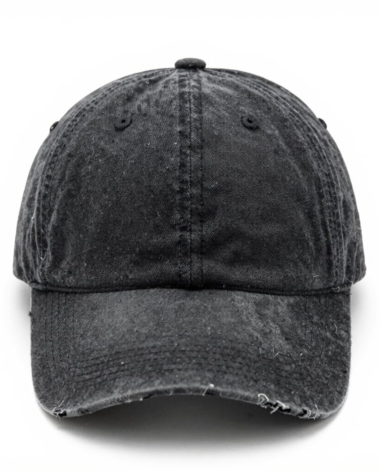 A pair of sleek sweatpants hanging on a minimalist rack beside a sporty cap.