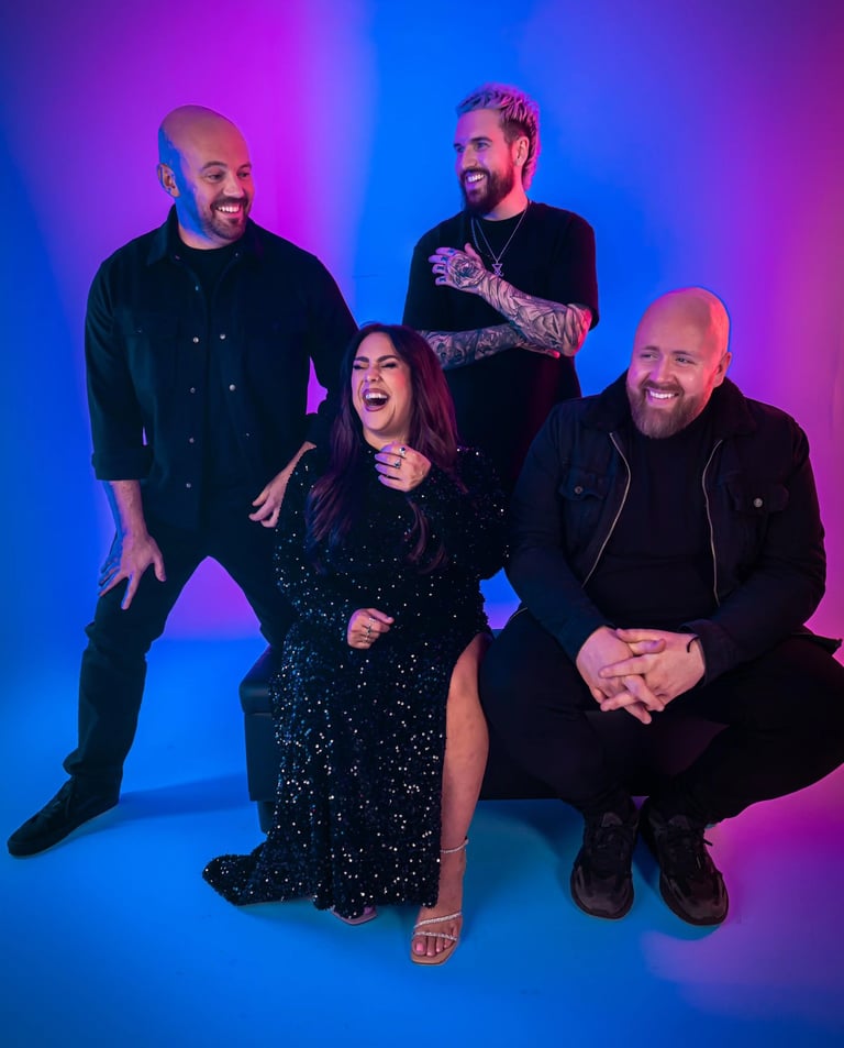 a group of people posing for a photo