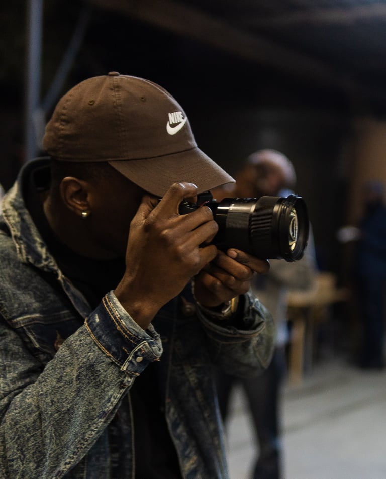 Peinge nakale taking a picture at an event