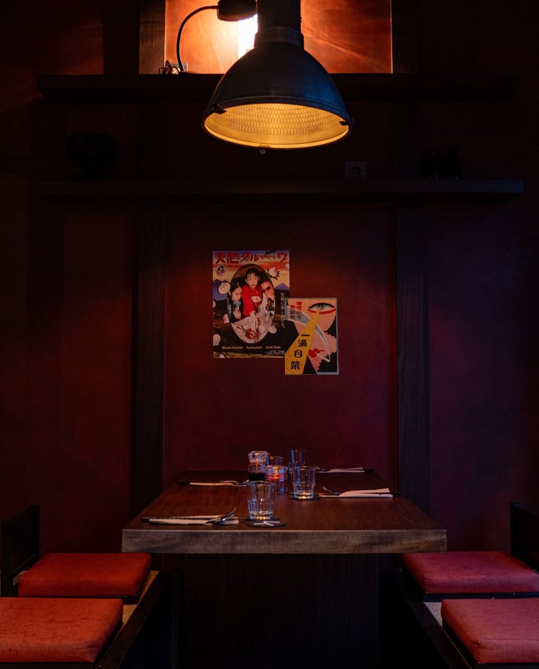 Kenji Ramen Bali modern Japanese izakaya interior - warm dining atmosphere with craft cocktails