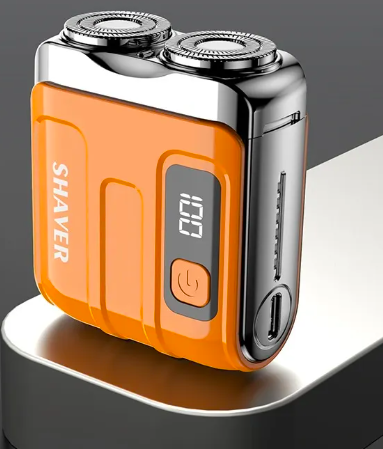 a mini portable shaver with two batteries on it