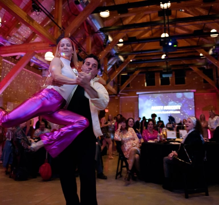 Mekhael Srour and Martha Slater dancing 80's night