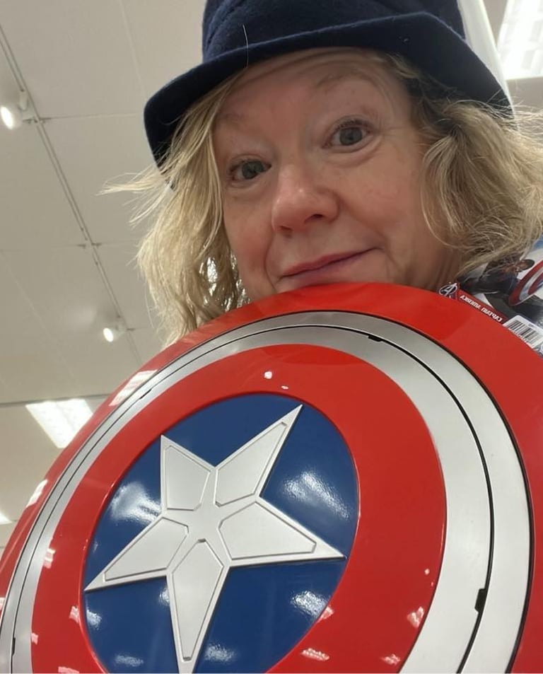 melissa hicks holding a shield