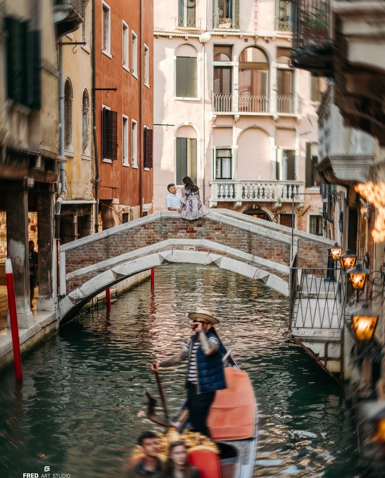 Couple on bridge over Venice canal