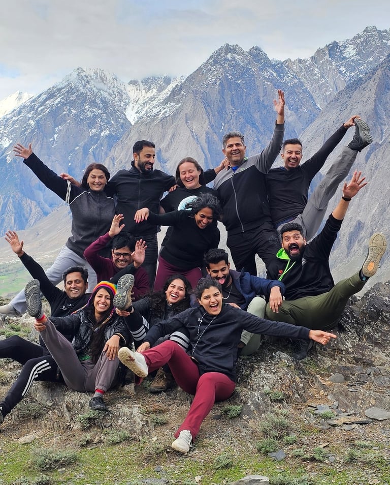a group of people having fun on a retreat in the mountains