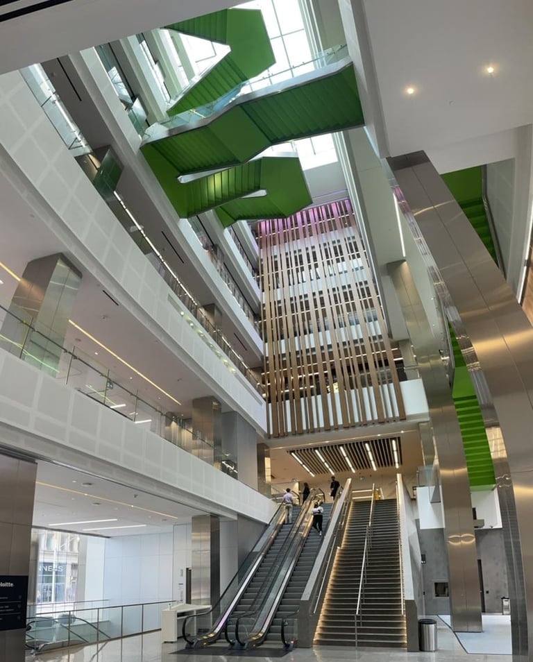Deloitte offices green modern angular feature stairs, made by Pengelly Iron Works
