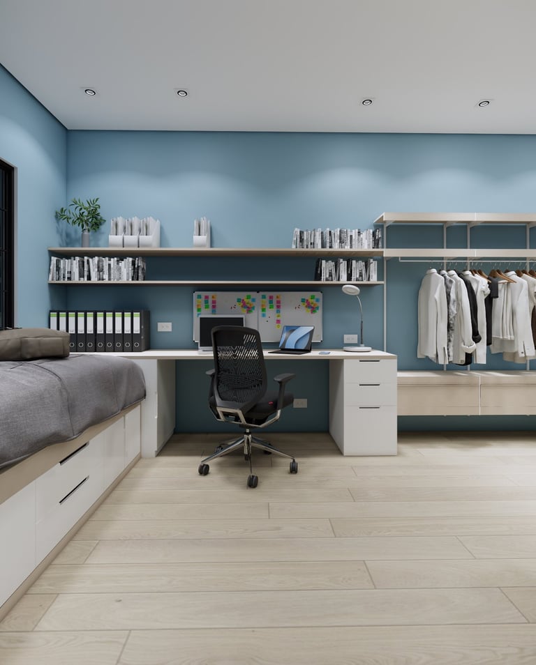 Modern bedroom home office with blue walls, built-in desk, shelving, and organized open closet.