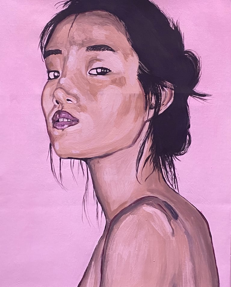 portrait of a woman of asian descent with a pink background