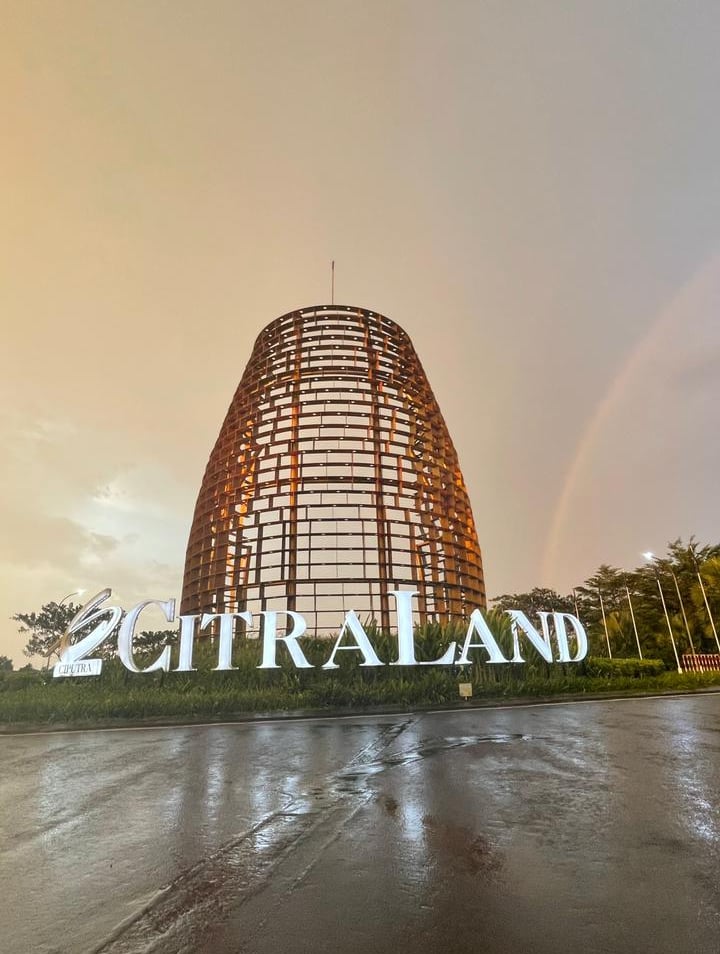 a rainbow - lite rainbow over a rainbow - lit sky