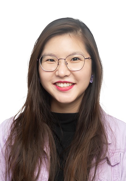 Dr Genevieve, licensed counsellor & co-founder of BAE Counselling, in her favourite colour purple