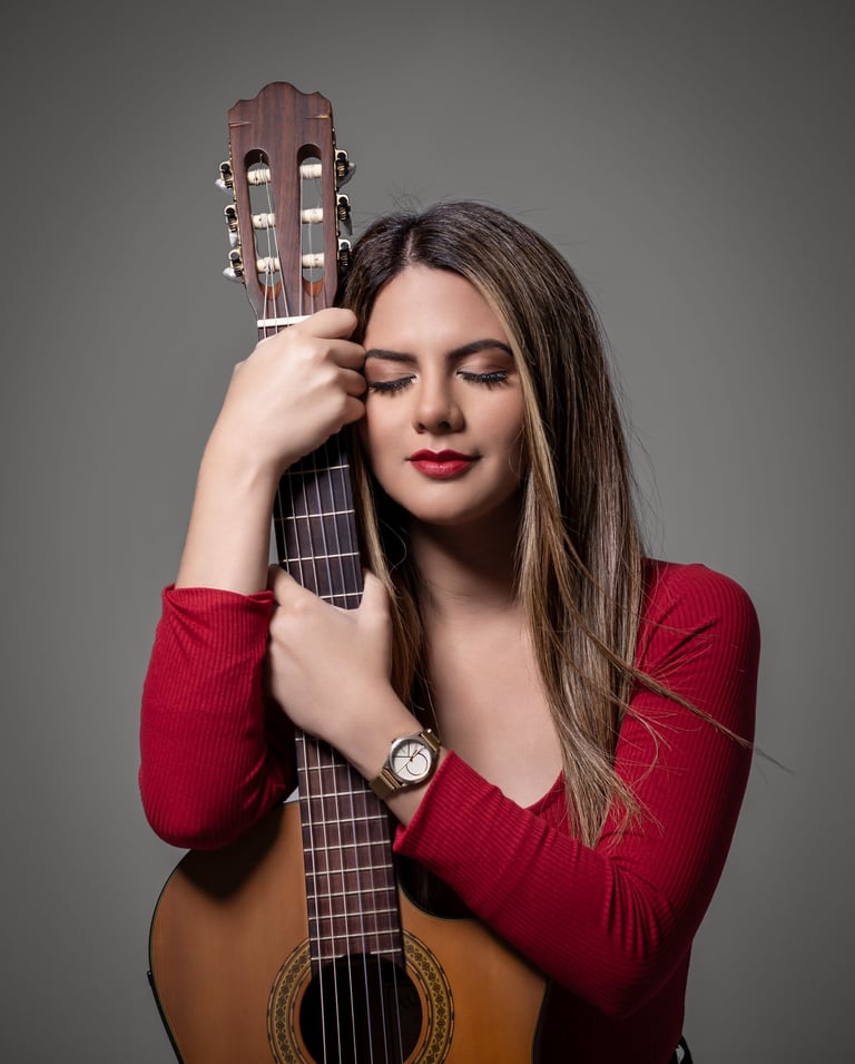 a woman with a guitar and a guitar