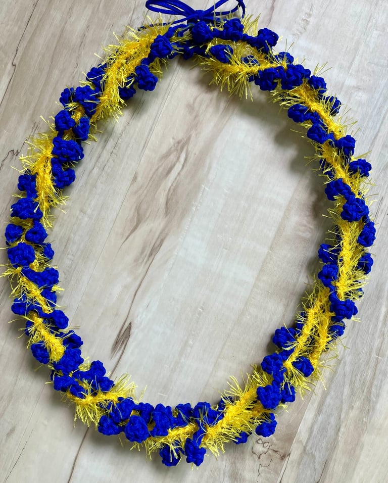 Royal blue and yellow twisted lei with bow at top