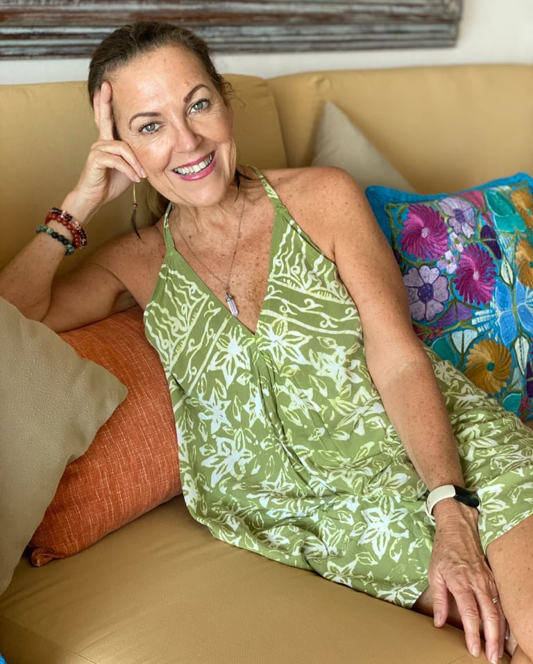 a woman sitting on a couch at retreat in Mexico