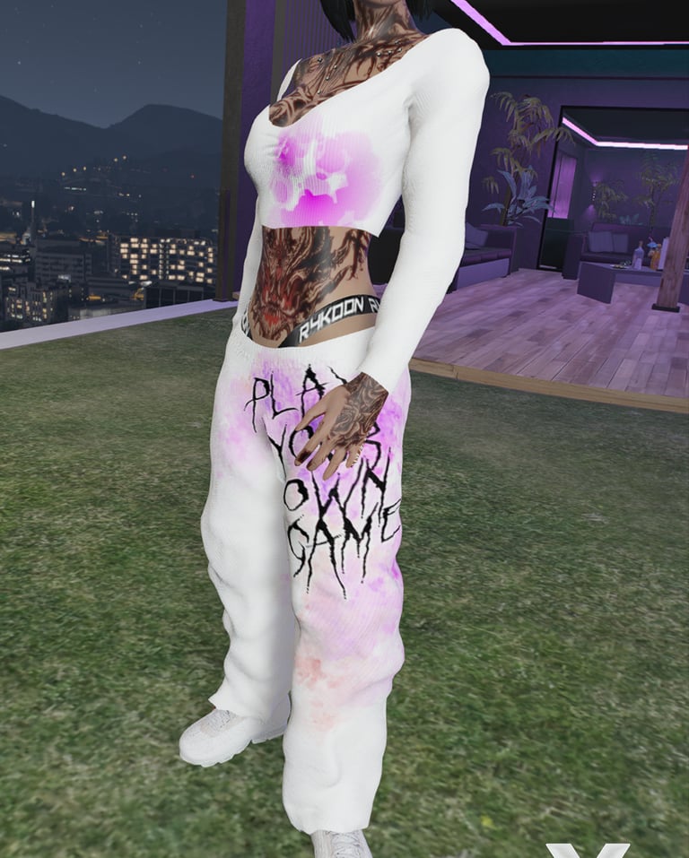 a woman in a white top and pants with a pink shirt