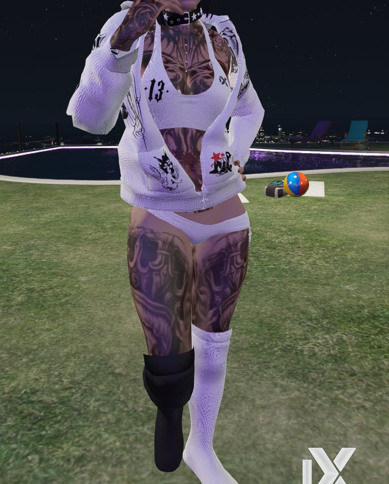 a woman with tattoos on her body and a tattoo on her chest