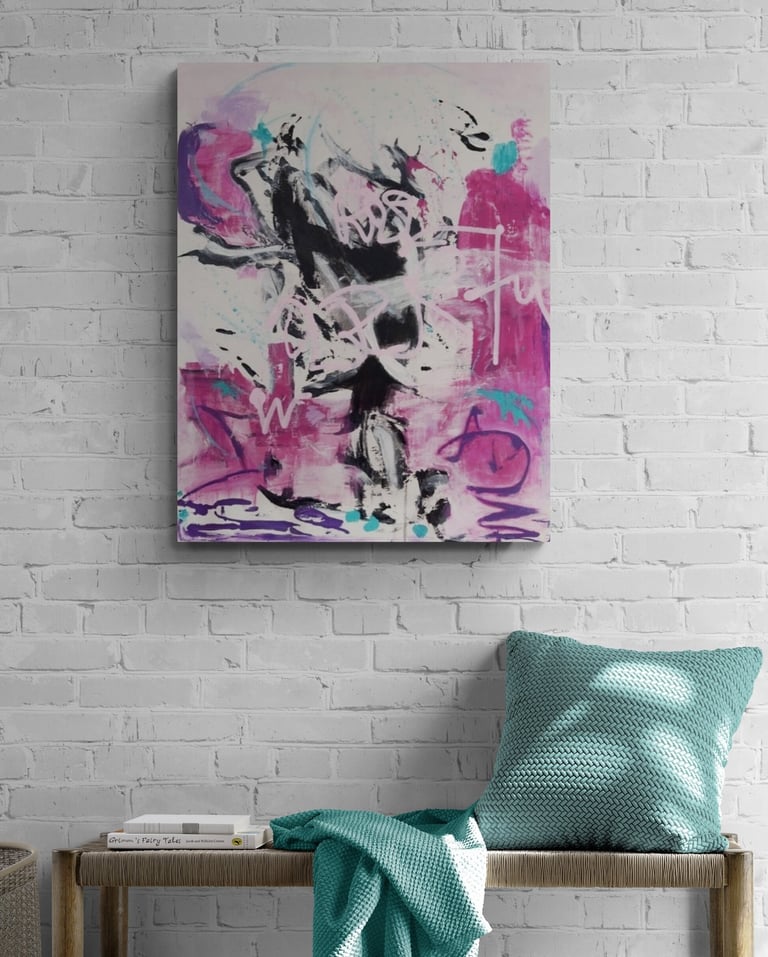 redviolet and black painting on a brick wall.