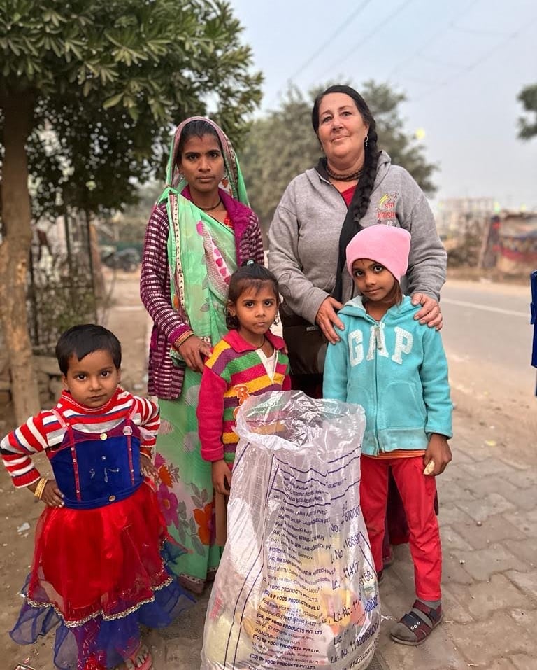 poor children accepting ration kits