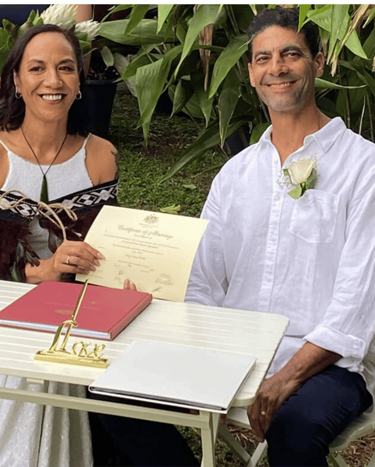 Image of Lana and Danny Weller, during their wedding, after the official paperwork signing