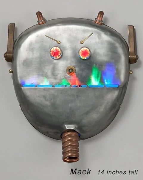 Assemblage robot head named Mack built by artist Tal Avitzur from vintage floor polisher.