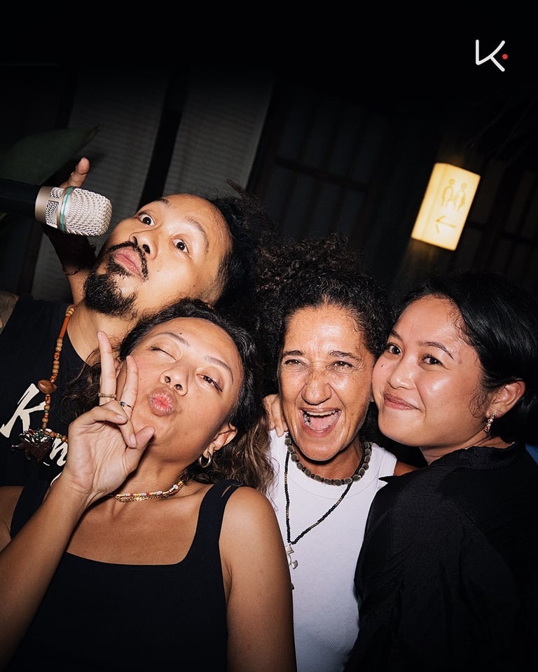 Kenji Ramen Bali vibrant evening atmosphere - izakaya dining with music and entertainment