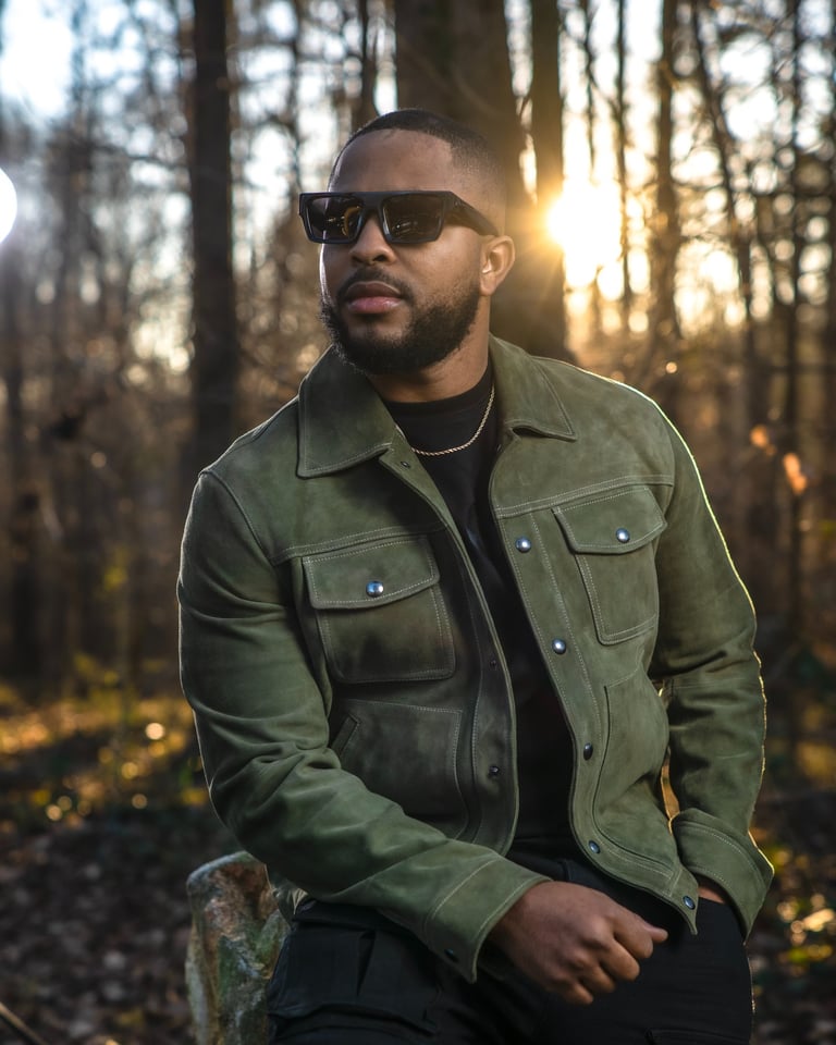 This is Tefo, a man in a green jacket and sunglasses