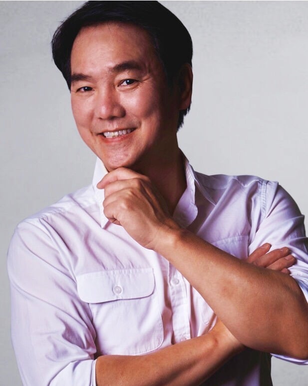 a man with a white shirt and a white shirt