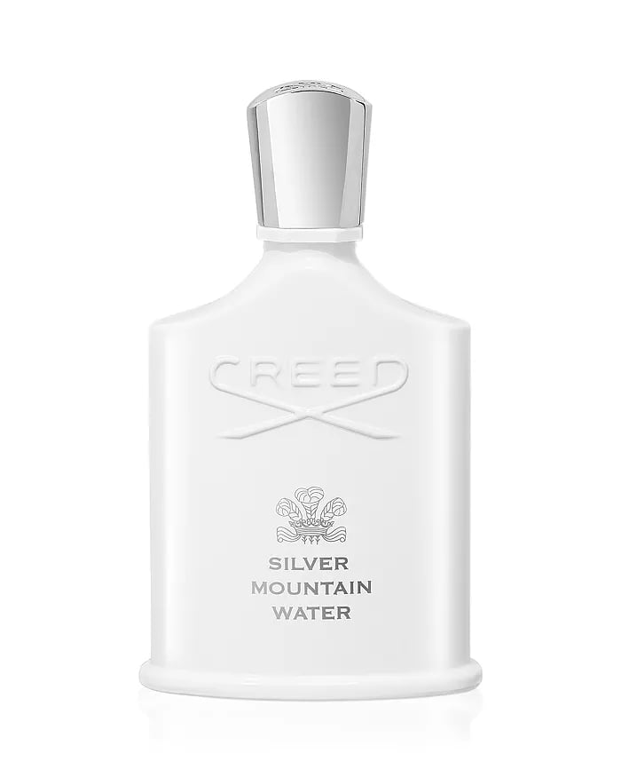 Creed Silver Mountain Water perfume bottle in opaque white with a silver cap.