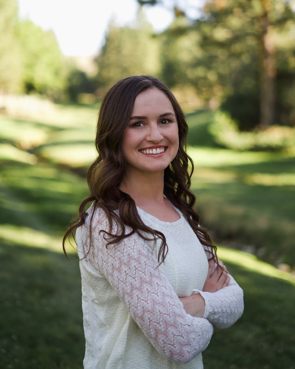 Kathryn Brown, PA-C, a physician's assistant at Archway Mental Health, smiling outdoors in Reno, Nevada. Wearing white shirt.