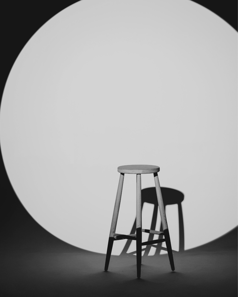 Minimalist studio photograph with dramatic lighting used to represent video-led brand storytelling