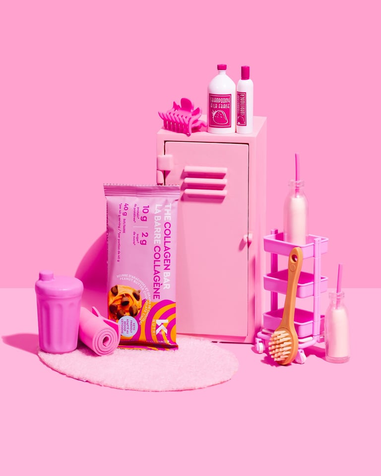 fitness locker with fitness accessories and peanut butter collagen bar on pink background