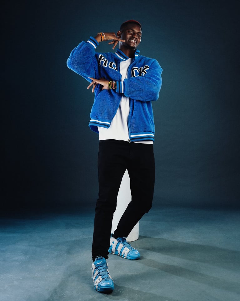 Afrofusion Beginner teacher Shawn of TheOne Studios in Nairobi, wearing blue college jacket