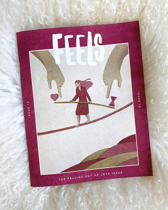 magazine cover of a woman walking on a tight line holding a balance stick, two hands pointing it