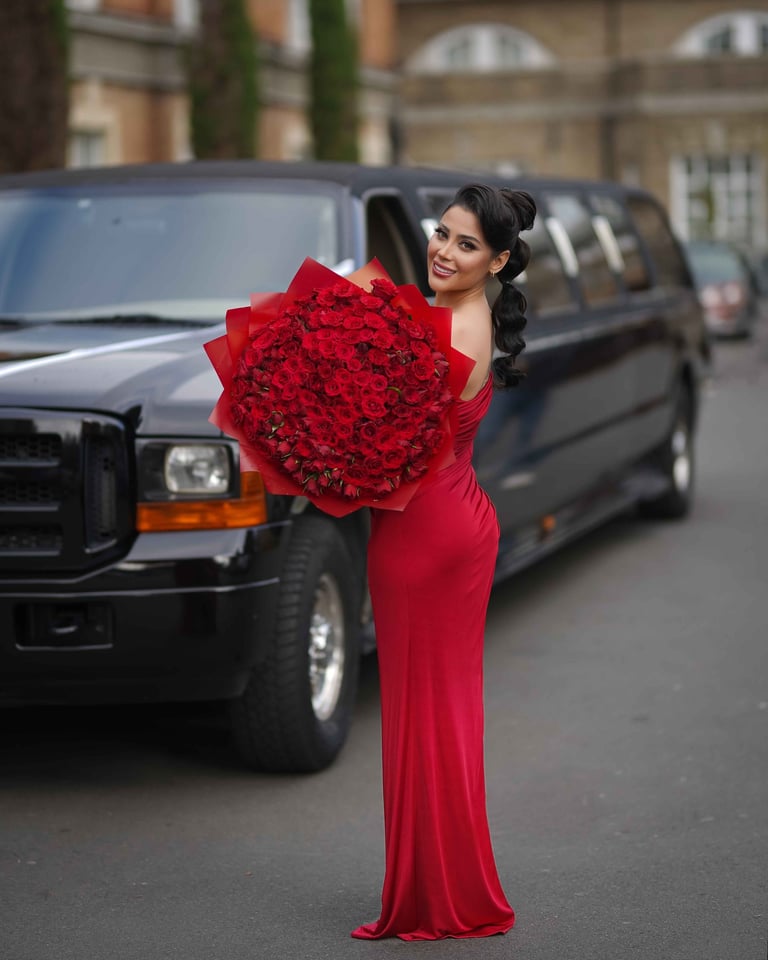 Birthday photoshoot with red roses and black limo, shot by Fred Art Studio