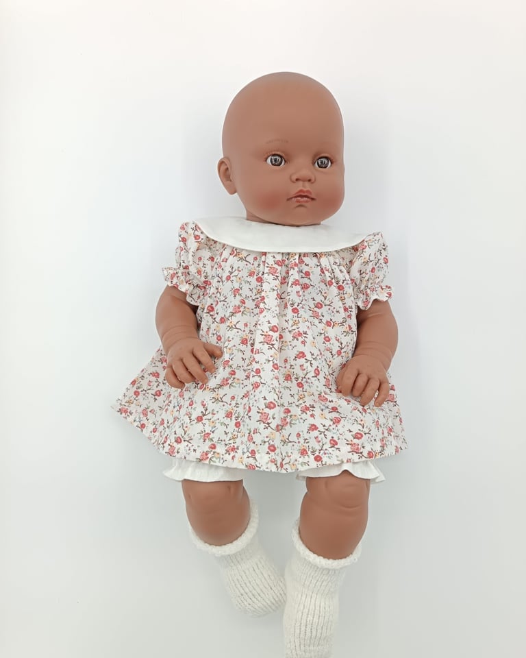 Minikane Les Bambinis doll in handmade dress and bloomers