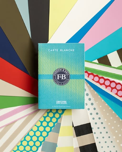 Farrow & Ball Carte Blanche color palette fan with Christopher John Rogers paint and wallpaper samples.