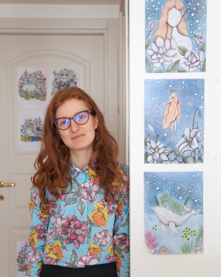 a woman in glasses and a blue shirt