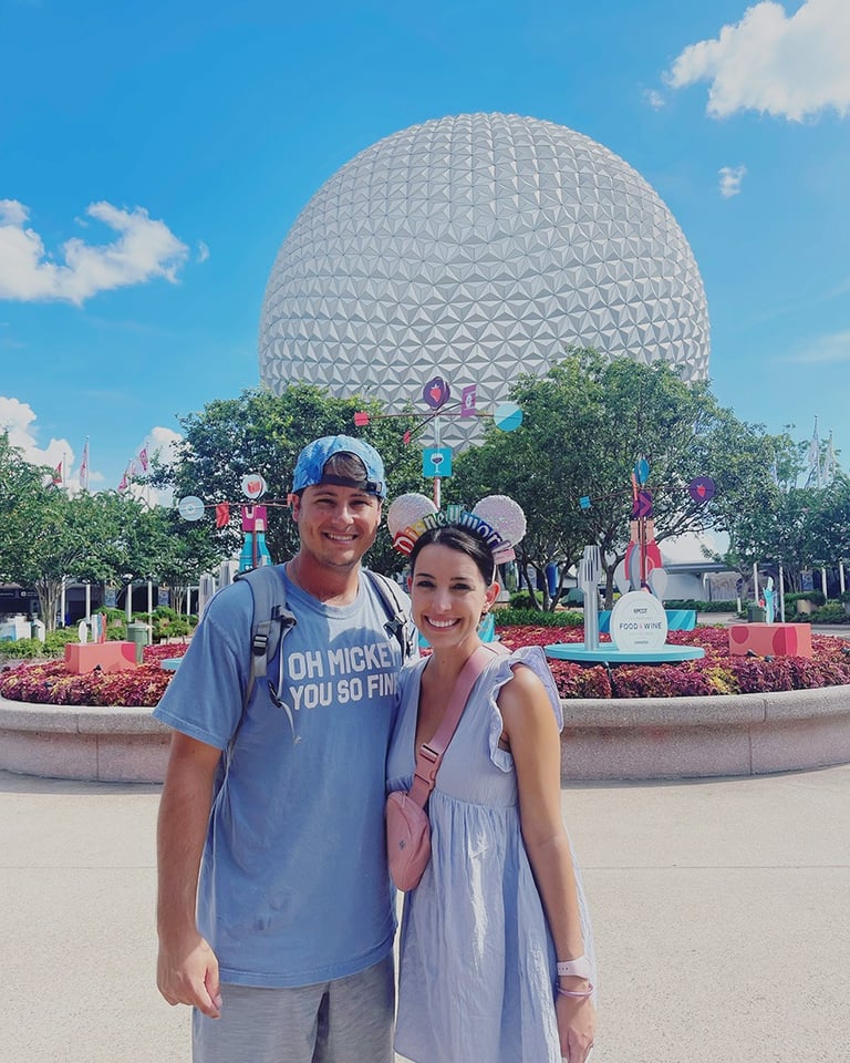 Jessica Henderson pictured in front of Spaceship Earth inside EPCOT®.