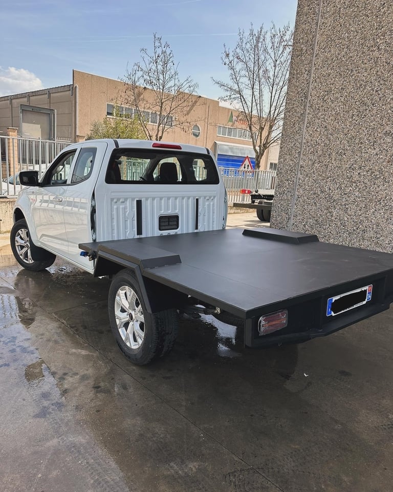 a pick-up truck with a platform
