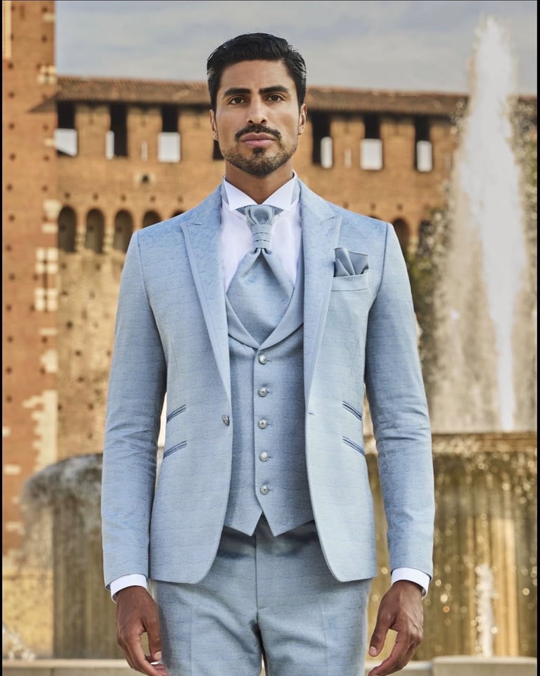 Dany Peña international male model in blue formal suit in Milan Italy