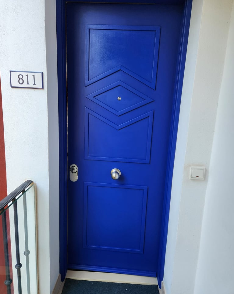 a blue door with a sign that says,'i am sorry to see the