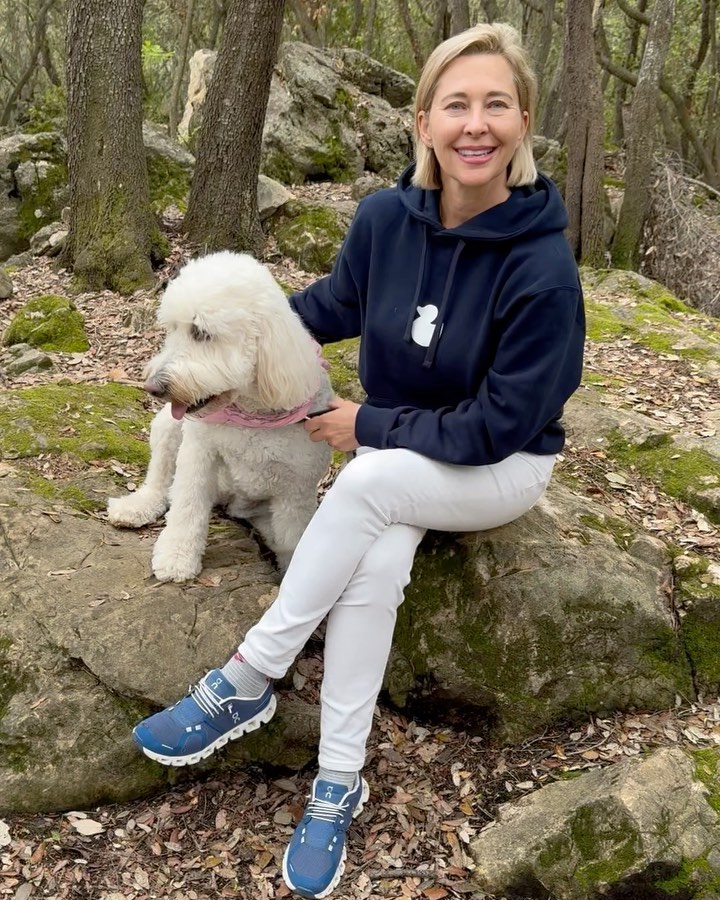 Lu, yacht industry entrepreneur, walking her dog in the countryside on the French Riviera